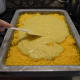 Spread the remaining corn bread batter atop the cheese layer.