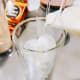 Pour in the milk (1 cup).