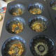 Spray the cake molds. Add melted butter and brown sugar.