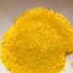 Transfer the cooked turmeric rice to a bowl. Smooth the top of the rice with the back of a spatula.