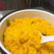 Steam the rice for 10 minutes. Open the lid and use a spatula to stir. Continue to steam for another 5 minutes.