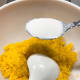Transfer the rice to the large bowl. Add coconut milk and mix evenly.