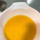 In a large bowl, soak the rice with water and turmeric overnight.