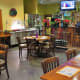 Interior dining space with bar area in the main dining room