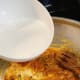 Add the coconut milk into the mixture.