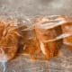 Cover it with saran wrap and pound it with a rolling pin.