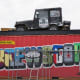 Brewston graphic mural by Alex Roman Jr., aka Donkeeboy