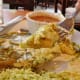 Chicken enchiladas with rice and beans