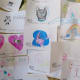 Art drawings by children on display inside of the store