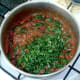 Coriander leaf/cilantro is stirred through the spinach curry