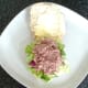 Corned beef mash is spooned on to salad bed