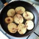 Frying chilli spiced potatoes