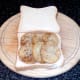Potatoes are arranged on one slice of bread