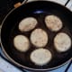 Chinese 5 spiced potato slices are put on to fry