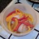Baked chicken thighs and peppers
