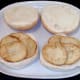 Drained potatoes are laid on bread rolls