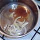 Spice mix ingredients are added to a saucepan