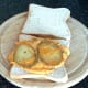 Fried egg omelette portion on bread