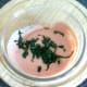 Blanched spinach is added to chilli sauce