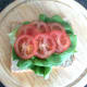 lettuce and tomato on bread base