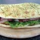 Second naan completes sandwich assembly