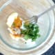 Egg is mashed with butter and seasonings