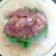 Bacon is laid over lettuce and tomato