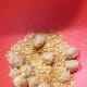Roll the balls in the crushed cornflakes to garnish.