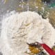 Add the cornflour and all-purpose flour to the mixture.