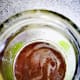 Collect the ghee in a clean and dry glass container, let it cool for 30 minutes and then cover with a lid.