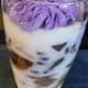 Step 4: Top with flan and ube ice cream.