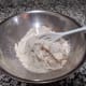 In a separate bowl, mix the dry ingredients together with a mixing spoon.