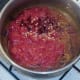 Tomatoes and chillies added to spiced onion