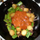 Jalfrezi sauce is added to stir fried vegetables