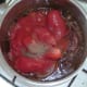 Tomatoes and seasonings are added to spiced onions