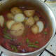 Potatoes are added to bean biryani