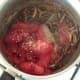 Tomatoes and chillies are added to the spiced and softened onions