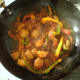Simmering potato and bell pepper rogan josh