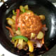 Rogan josh sauce is added to stir fried vegetables