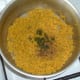 Chopped mint and black pepper are added to turmeric brown rice