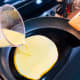 Pour the egg mixture into the caramel.