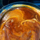 As it heats up, the color of the mixture turns brown.