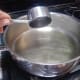 Once the pan is hot, add the oil and reduce the heat.