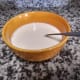 Dilute the cornstarch in the milk and set aside.