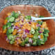 Gently combine the broccoli, onion, cheese and mandarin oranges in a bowl.