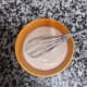In a separate bowl, whip together the mayonnaise, apple cider vinegar and sugar to create the dressing.