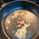 Fry the minced ginger, garlic, and chili flakes for a few minutes.