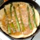 Eggs are mostly set around asparagus and chickpeas