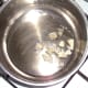 Garlic is sauteed in oil