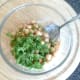 Chickpeas and coriander are added to raita sauce